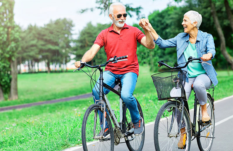 Del Webb Mallory Creek - Couple on Bikes